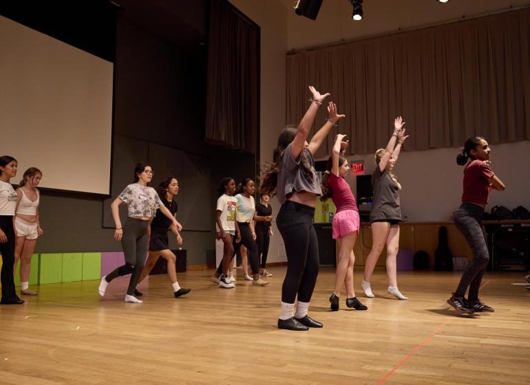 Students practicing for Youth Musical Theater