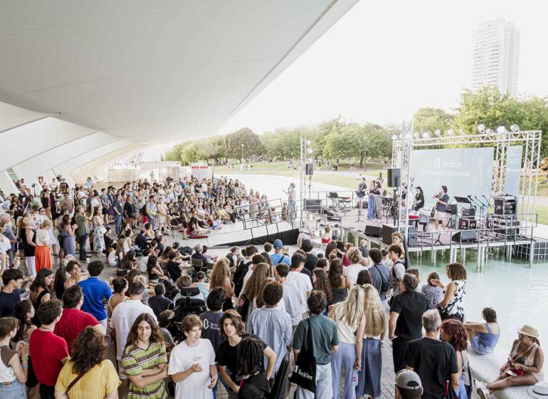 A band performs on stage at the Berklee Valencia Campus