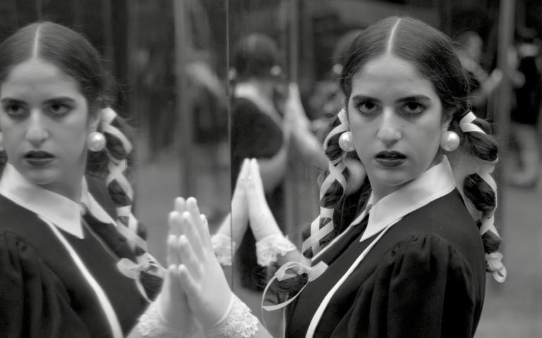 A still from Ava Della Pietra's music video for "Marionette."