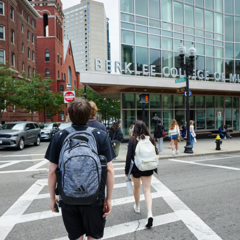students walking through the crosswalk 